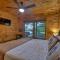 Bearfoot Ridge Wood-burning fireplace cozy hot tub serene views