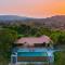 StayVistas Basalt - with Mountain Views, Infinity Pool, Vintage Interiors, and Games Room
