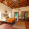 StayVistas Basalt - with Mountain Views, Infinity Pool, Vintage Interiors, and Games Room