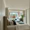 3 bed Garden Apt, Clifftop, sleeps 8 with parking and Lazy Spa