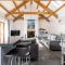 Re-imagined Stone Barns in the Country Near the Coast