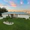 Serenity Waterfront Villa with King Suite, Private Pool, Great Lanai Enclosure and Long Water Views - Cape Coral