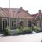 Atmospheric Wadden houses located next to each other near the Wadden Sea - Paesens