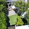 Magnific Studio with a cozy garden, 5 minutes to the beach