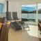 H21 - Modernes Ferienhaus 145qm, 4SZ, Wellnessbereich mit Sauna und Dachterrasse mit Panoramablick, Kühlen und Heizen mit Geothermie