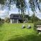 Attractive holiday home by the lake - Großzecher