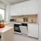 Bright Apartment with Balcony Close to the Poniatowski Park Łódź by Noclegi Renters