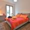 Apartment Olmo Garden Apartment by Interhome