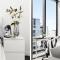 A Stylish 2BR Apt Next to Southern Cross with City Views