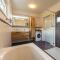 H19 - Modernes Ferienhaus 145qm, 3SZ, Wellnessbereich mit Sauna und Dachterrasse mit Panoramablick, Kühlen und Heizen mit Geothermie