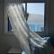 Greek Island Style 2 bedroom Villa with Pool next to the Sea