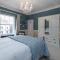 Abbey Lodge, Llandudno - Period Townhouse, 5 bedrooms & bathrooms, with Hot Tub & Private Parking