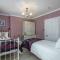 Abbey Lodge, Llandudno - Period Townhouse, 5 bedrooms & bathrooms, with Hot Tub & Private Parking