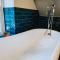 Abbey Lodge, Llandudno - Period Townhouse, 5 bedrooms & bathrooms, with Hot Tub & Private Parking