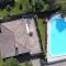 Villetta Arcobaleno - Ferienhaus in Bardolino mit Seeblick, Terrasse und gemeinsamem Pool