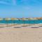 Rincón Playa, terraza y piscina