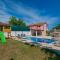 Ferienhaus mit Privatpool für 8 Personen ca 185 qm in Grubine, Dalmatien Dalmatinisches Hinterland - Grubine