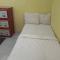 SPOT ON 93886 Kost Zalfa Amalia Syariah