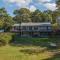 Waterfront home with Hot Tub Firepit and Game Room