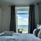 Luxury Sea View Apartment with Multi Room Balcony And Private Onsite Parking Only 300M From the Beach - لوي