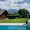 Chalet avec vue panoramique sur les Montagnes du Mole et la chaîne des Aravis piscine chauffée à 5 min des pistes de la station des Brasses - Viuz-en-Sallaz