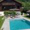 Chalet avec vue panoramique sur les Montagnes du Mole et la chaîne des Aravis piscine chauffée à 5 min des pistes de la station des Brasses - Viuz-en-Sallaz