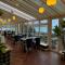 Nomi Rooms & Restaurant