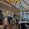 Nomi Rooms & Restaurant