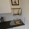 Modern immaculate studio with AC & parking, outside the CAZ