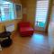 Maison en bois 4 personnes sur lac, Cantal - Lacapelle-Viescamp