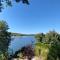 Maison en bois 4 personnes sur lac, Cantal - Lacapelle-Viescamp