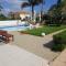 POSEIDONIA BEACH GARDENS
