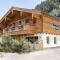 Birnbaum Chalet Kreuzkogel mit Naturbadesee und eingezäunten Garten - Grossarl