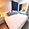Beautiful Guesthouse, Sleeps 4 - Kitchen, Private Laundry, AC, Parking, 65 TV, Close to Stores, Restaurants & Beach