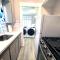 Beautiful Guesthouse, Sleeps 4 - Kitchen, Private Laundry, AC, Parking, 65 TV, Close to Stores, Restaurants & Beach