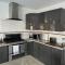 One bedroom with modern kitchen, balcony with water view