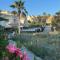 STYLISH TOWNHOUSE IN BEACHFRONT COMPLEX