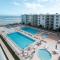 Amazing views of the ocean and pool from this top floor beach retreat! - New Smyrna Beach