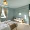 Bright Apartment w Parking & Distant Sea Views