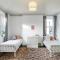 Bright Apartment w Parking & Distant Sea Views