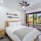 Modern Split-Level 2-Bedroom Condo with Pools, Terrace & Easy Beach Access