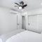 Modern Split-Level 2-Bedroom Condo with Pools, Terrace & Easy Beach Access