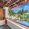 Modern Split-Level 2-Bedroom Condo with Pools, Terrace & Easy Beach Access