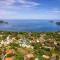 Modern Split-Level 2-Bedroom Condo with Pools, Terrace & Easy Beach Access