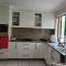 Holiday Style A downstairs room in Springwood Qld