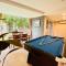 Holiday Villa by StayCo- Swimming Pool - Karaoke - BBQ - Event space - 2 mins drive to beach - center of tourist location - 丹绒武雅