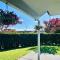 Summer Holiday 4 bedrooms house in Hamilton with pool and spa