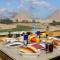 Pyramids Land Suites - 开罗