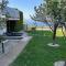 TERRA MAGICA DELUXE Apartment Or Room with Free Parking, Terrace and Sea View