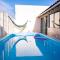 Casa Areal, 1 Suíte, 2 quartos, piscina garagem para 2 carros - بيلوتاس